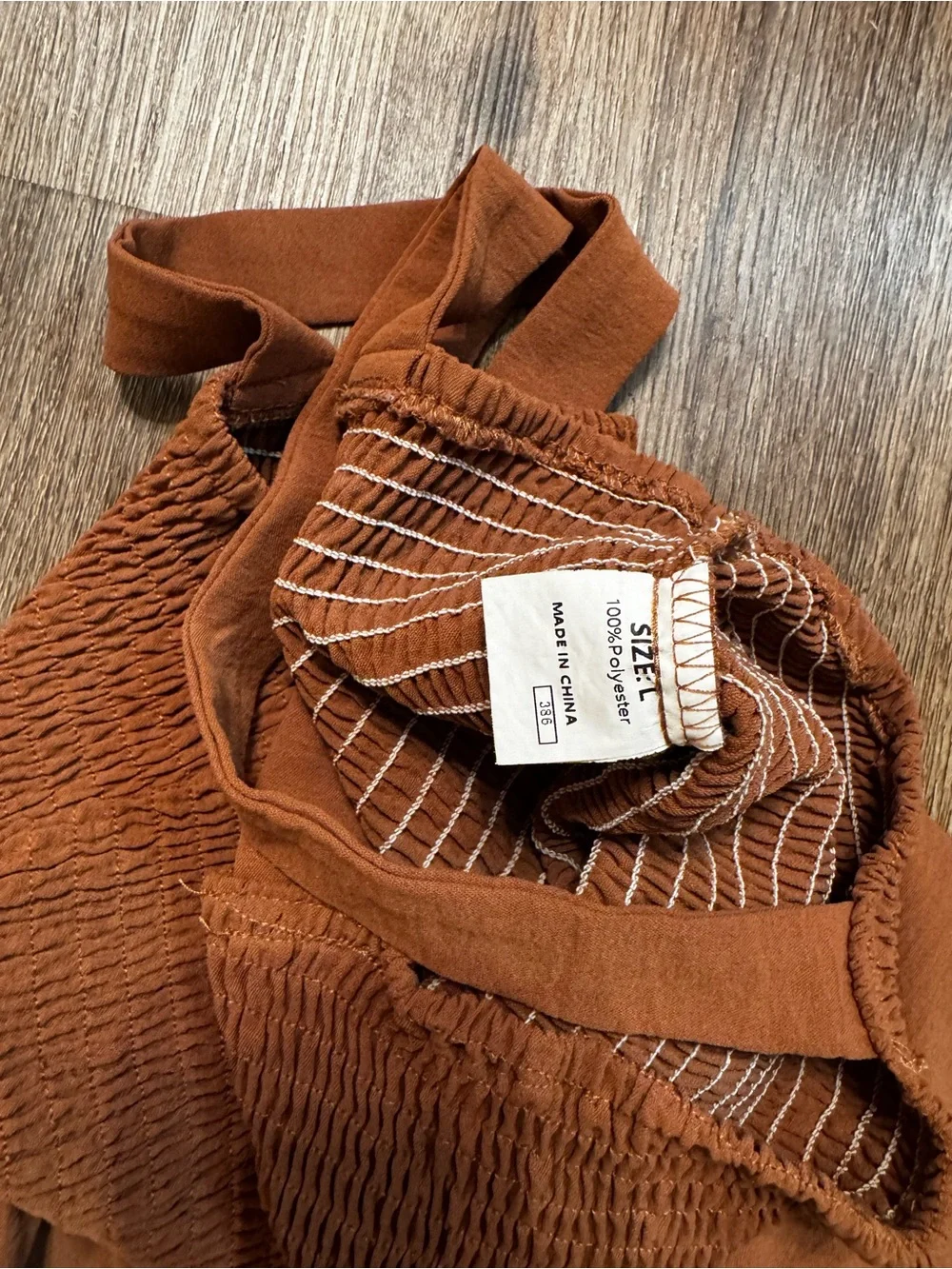 Women’s brown smocked romper